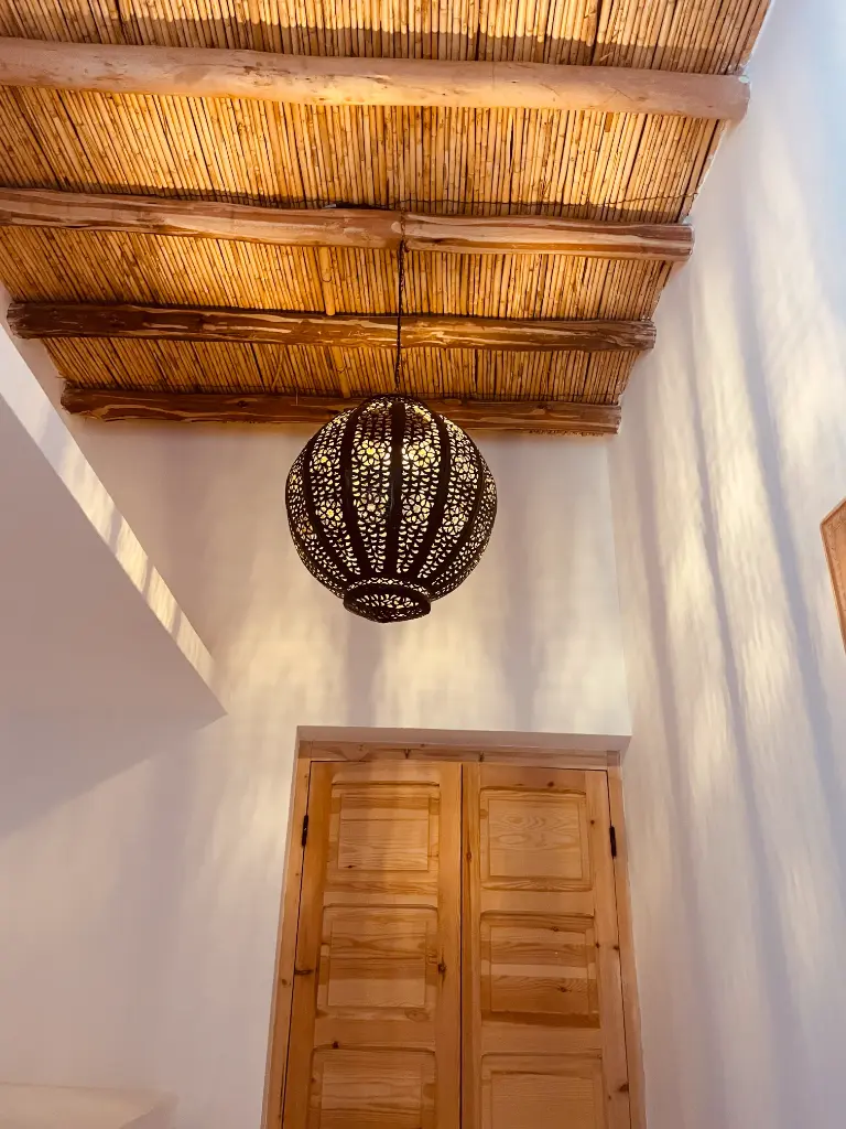 Luminaire boule en métal bronze L