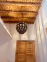 Luminaire boule en métal bronze L